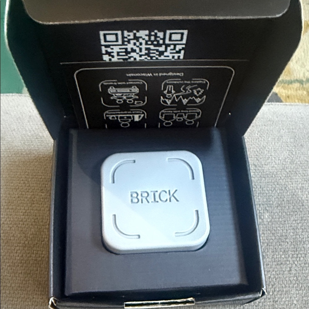 BRICK branded white tech accessory - White. Brand new in box, unused.